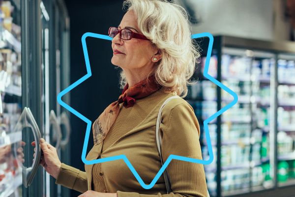 George shopping cards image of a woman in a supermarket