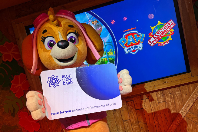 Paw Patrol dog holding a Blue Light Card at Chessington