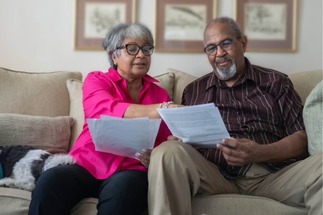 Older couple looking at paperwork