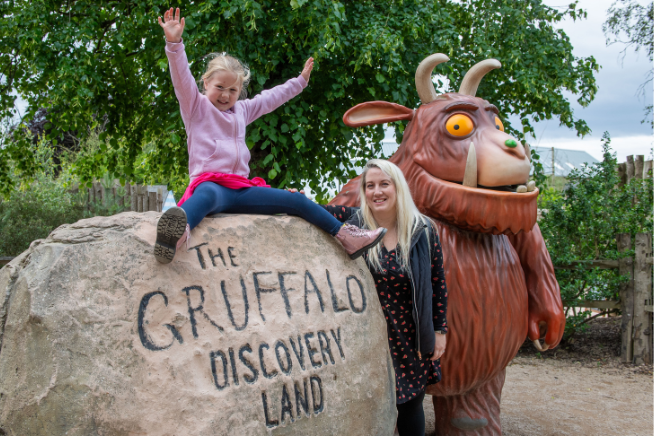 Family happy at the Gruffalo Land at Tywcross Zoo