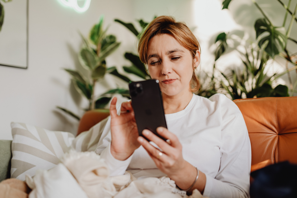 Woman looking at something on her phone