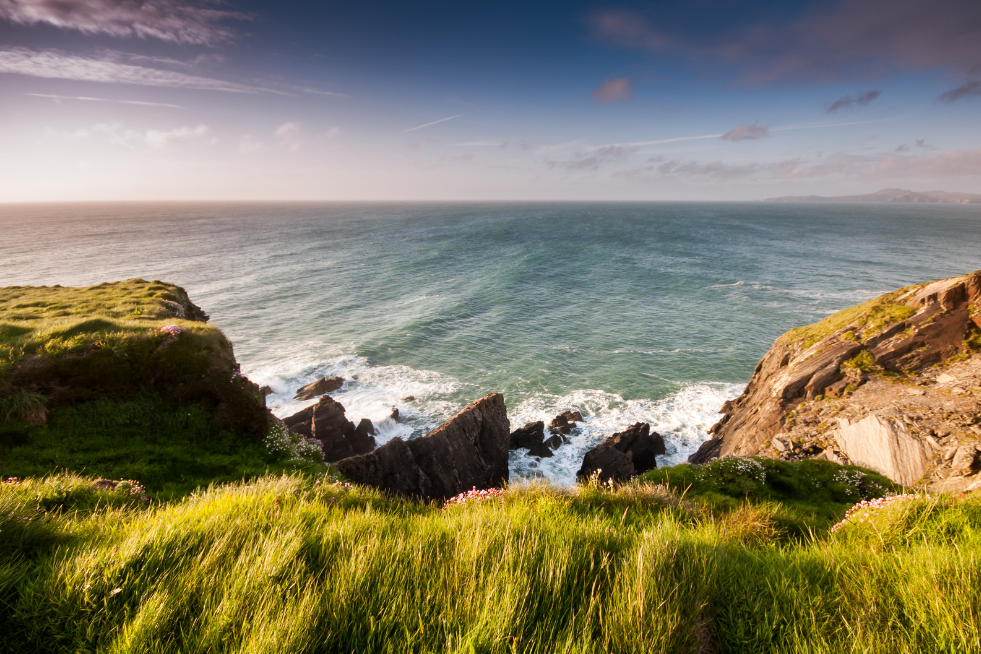 Crashing waves against a rugged coast