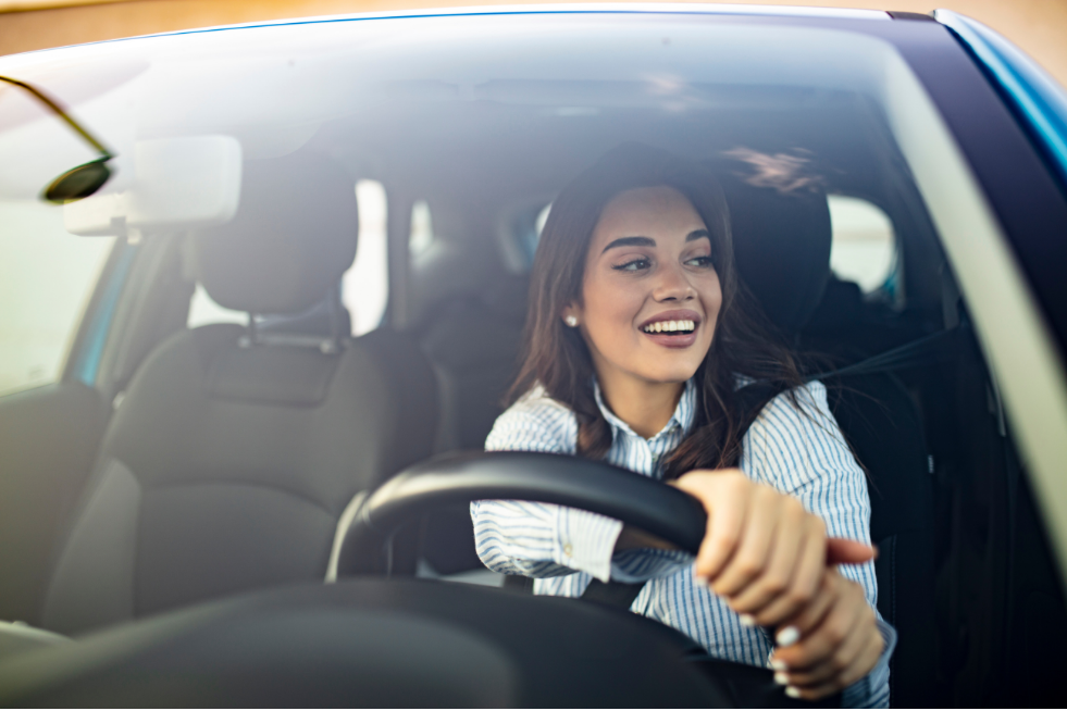 A woman driving a car 