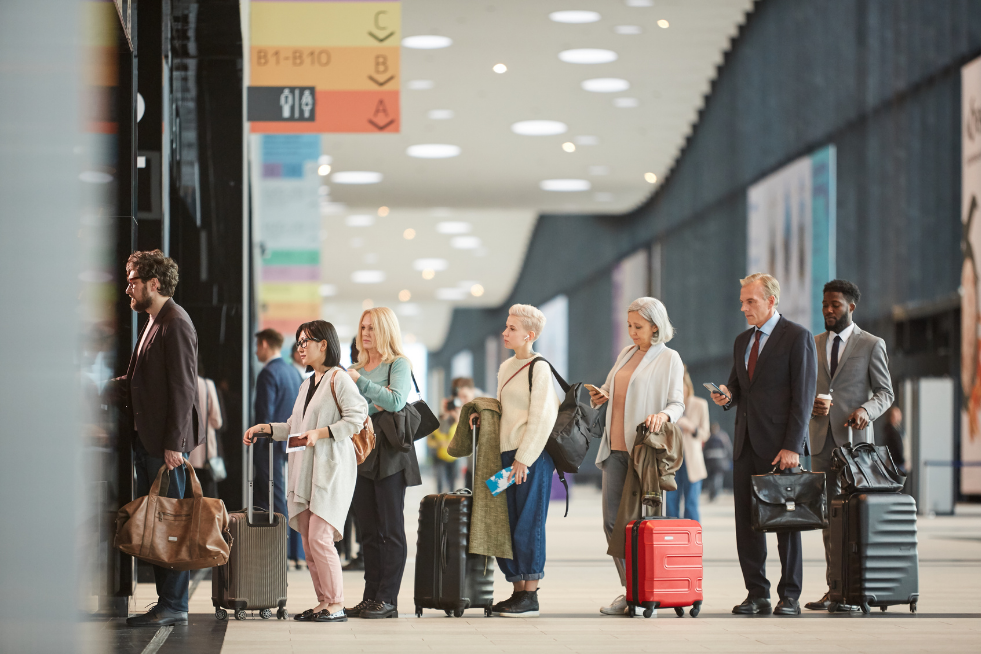 People waiting in line at an airport