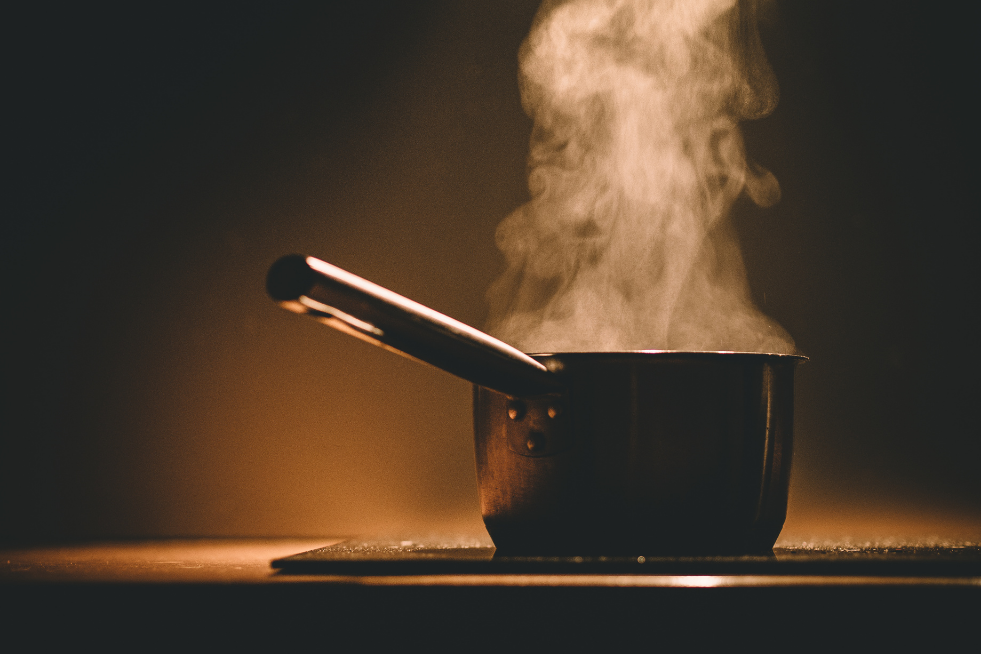 A steaming pan on the hob