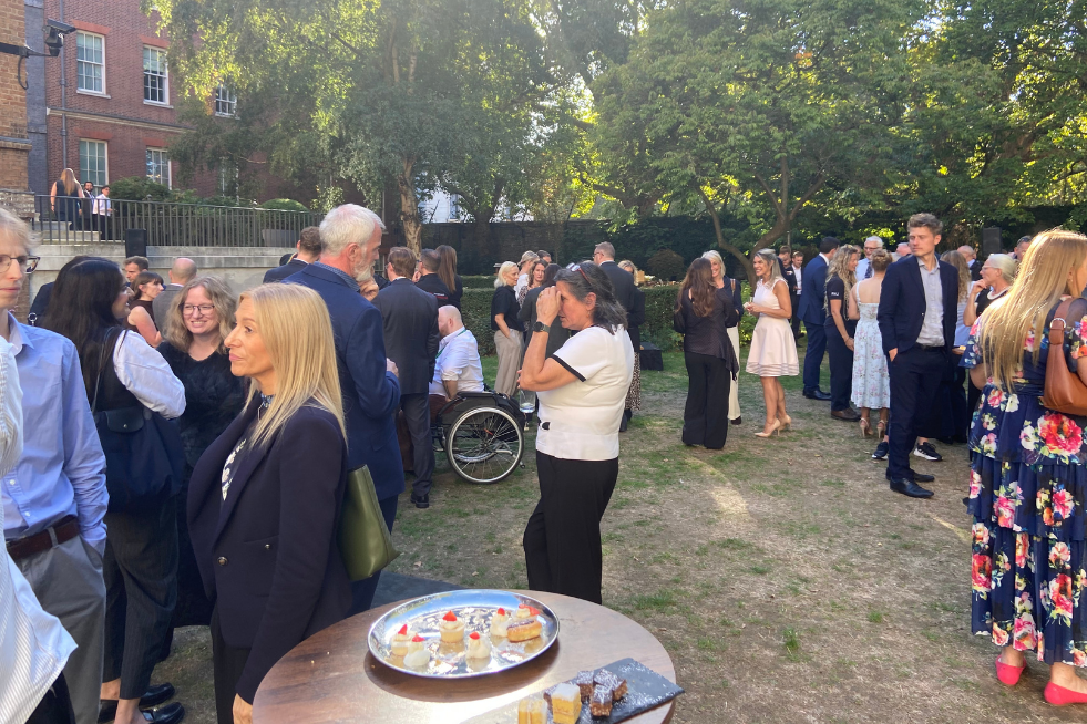 Guests chatting in the garden at No. 10