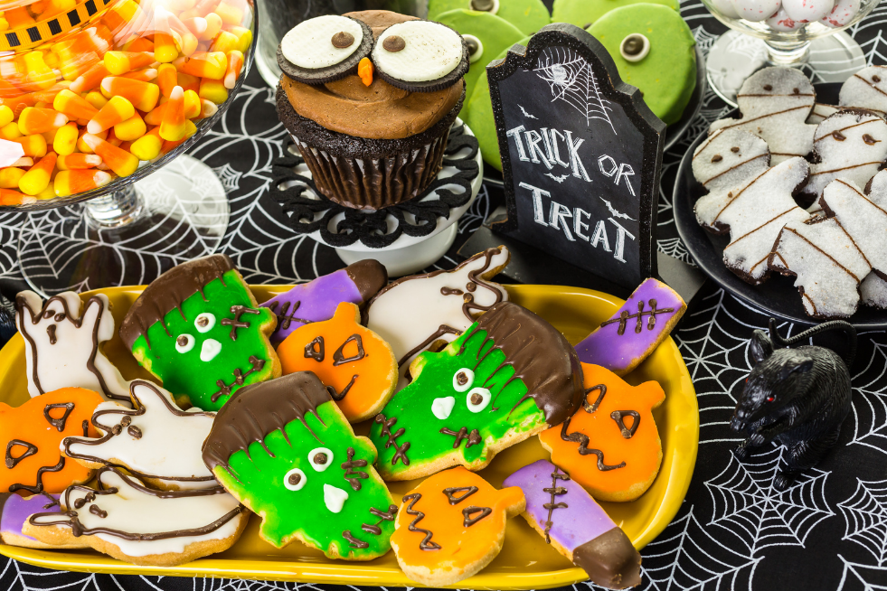 Biscuits decorated as Frankenstein, ghost and pumpkins 