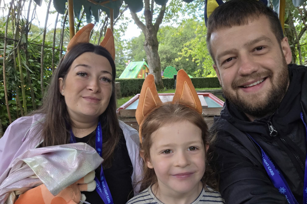 Family of three with Bluey ears