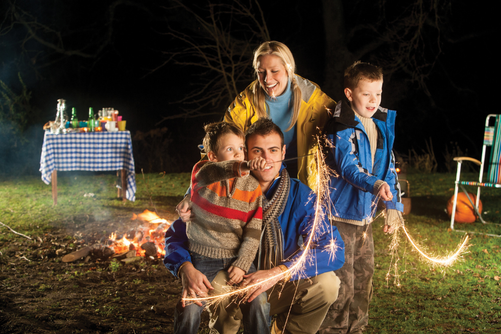 A family using sparklers