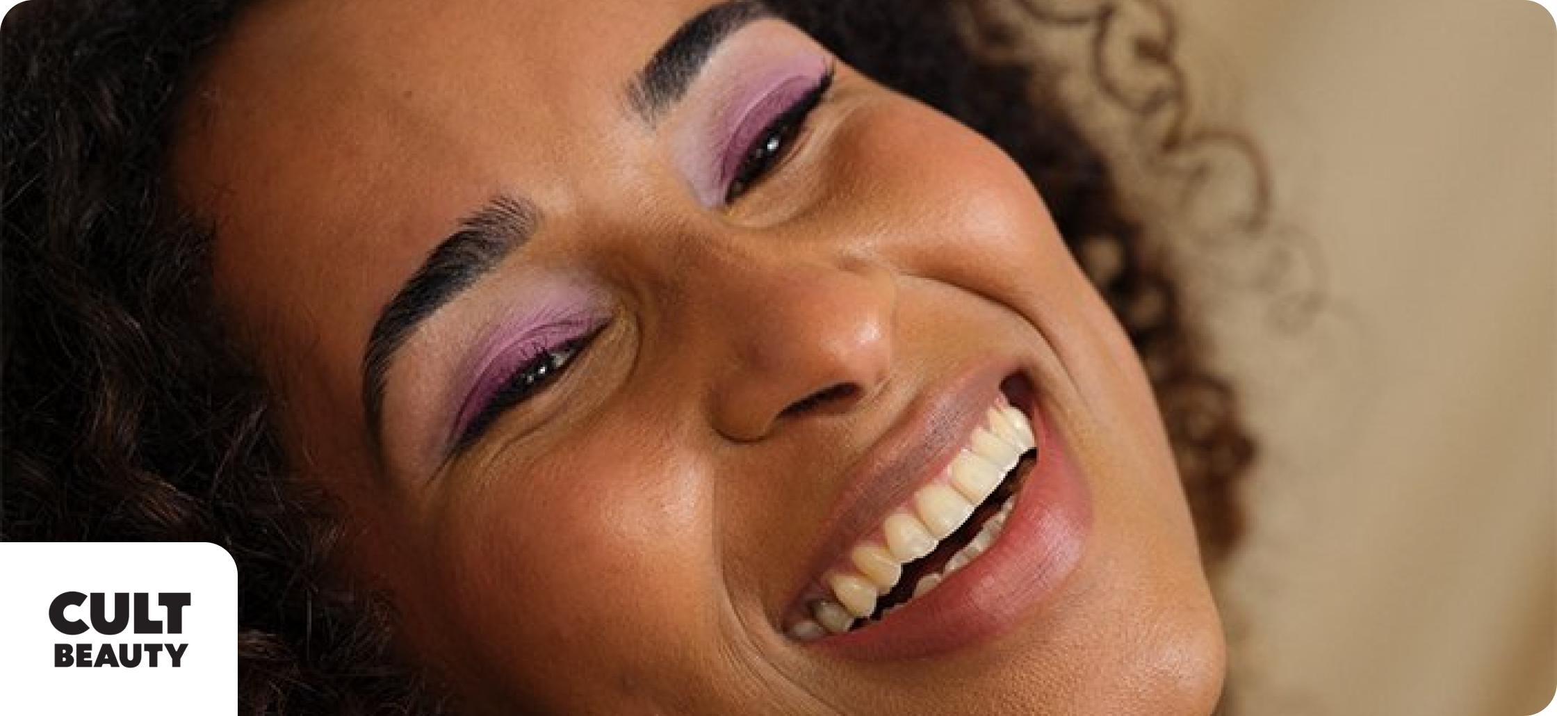 Cult Beauty discounts banner image showing a woman smiling